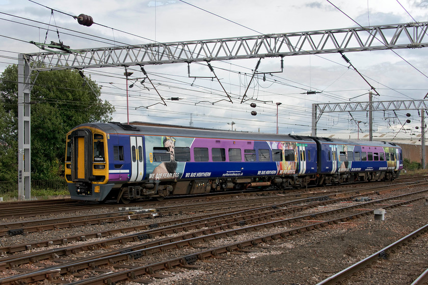 26. 158844, NT 15.40 Newcastle-Carlisle (1N67, 3L), Carlisle station 
 A notable feature of the privatised railway is frequent and unusual special one-off graphics that adorn trains. Whilst many are just gross advertising as a way for TOCs to supplement their substantial profits I am not at all sure what this one is? 158844 arrives at Carlisle forming the 15.40 terminating service from Newcastle. Given the appalling service that Northern has been offering their customers during recent times the 'We are fearless - we are Northern' message is a little incongruous? If I was a frequent user of Northern I might be a little insulted if this train pulled into my local station? 
 Keywords: 158844 15.40 Newcastle-Carlisle 1N67 Carlisle station