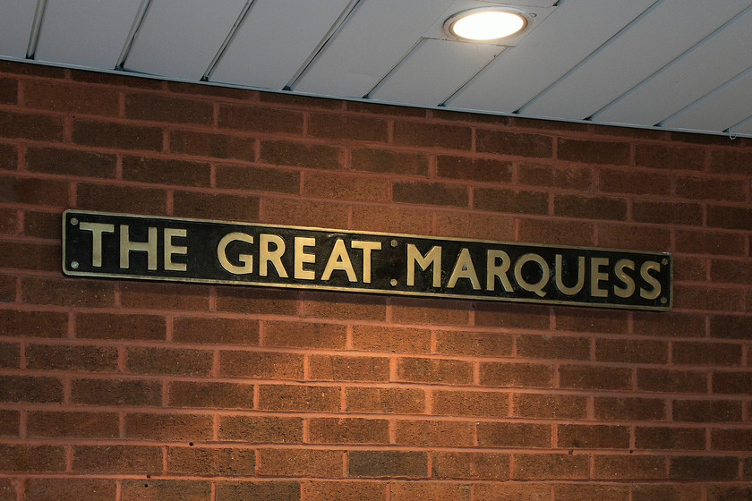 Replica nameplate, Morrisons supermarket, Bishop Auckland 
 On entering the Morrisons store in Bishop Aukland to have a late breakfast, Andy and I were surprised to see a number of replica nameplates and headboards on-display in the lobby. Designed specifically for the steeply graded West Highlands line the LNER Gresley K4 number 61994 wore the original plates 'Great Marquess' a copy of which is seen here. Unfortunately, the Morrisons breakfast was not up to standard. There were obvious staff issues and after a very long wait, it arrived in far from peak condition! 
 Keywords: Replica nameplate Morrisons supermarket, Bishop Auckland