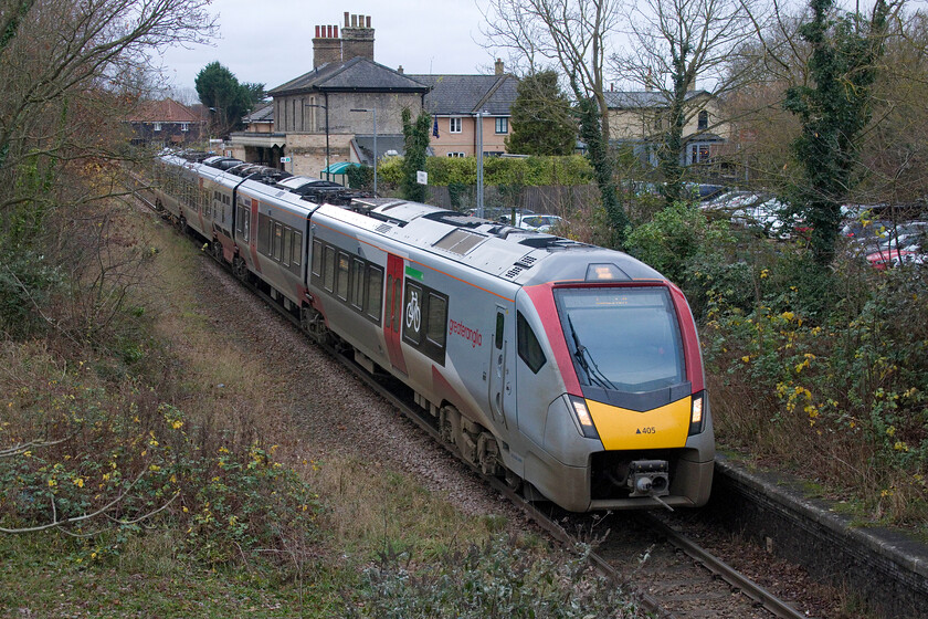 755405, GA 12.16 Ipswich-Lowestoft (2D78, 2E), Wickham Market station 
 Greater Anglia's FLIRT 755405 leaves Wickham Market station working the 12.16 Ipswich to Lowestoft service. As can be seen from this photograph, this line was once double track throughout but with today's services having to make do with single line working helped considerably by the building of a passing loop at Beccles in 2012. 
 Keywords: 755405 12.16 Ipswich-Lowestoft 2D78 Wickham Market station Greater Anglia FLIRT