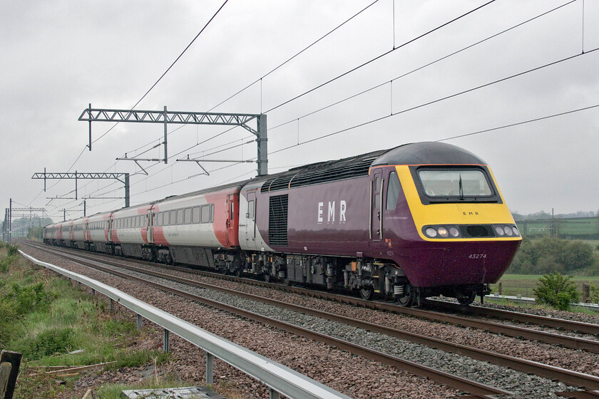 43274, EM 07.40 Leeds-London St. Pancras (1B28, 1E), 'the last up HST', Wymington SP946644 
 The final up HST working......

A profound and significant moment on the railways of the UK sees power car 43274 lead the final ever up HST working! Having worked into Paddington, King's Cross and St. Pancras throughout their working lives the HST has become synonymous with fast, comfortable and reliable rail transportation but the 07.40 Leeds to St. Pancras 1B23 service brings the curtain down. With 43102 'The Journey Shrinker' bringing up the rear the train is seen passing Wymington in Bedfordshire. 
 Keywords: 43274 07.40 Leeds-London St. Pancras 1B28 the last up HST Wymington SP946644 EMR East Midlands Railway HST