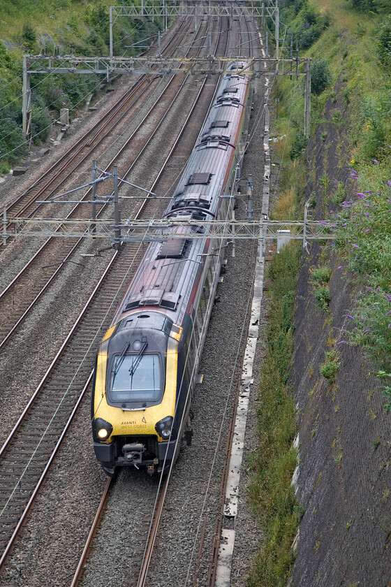 221108, VT 16.02 London Euston-Holyhead (1D90, 3L), Roade cutting 
 Could THIS one be the last? 221108 passes Roade cutting working the 16.02 Euston to Holyhead AWC service. I will keep photographing the Voyagers on the West Coast Mainline whenever I see them as their time is really limited now with the Class 805's now much in evidence. 
 Keywords: 221108 16.02 London Euston-Holyhead 1D90 Roade cutting AWC Avanti West Coast Voyager