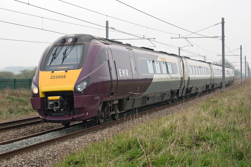 222008, EM 07.04 London St. Pancras-Nottingham (1D07, 1L), Wymington SP956634 
 222008 descends from Sharnbrook summit at a rate of knots working the 07.04 St. Pancras to Nottingham EMR service. The train is seen passing near the village of Wymington in Bedfordshire at a point where the slow and fast lines are separated by a field rather than running side by side as they do for the rest of the route from London to Kettering's Glendon Junction. 
 Keywords: 222008 07.04 London St. Pancras-Nottingham 1D07 Wymington SP956634 EMR Meridian East Midland Railway