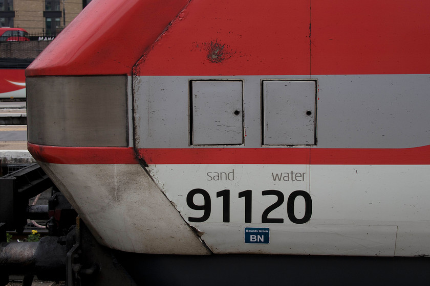 Number, 91120, GR 13.30 London King`s Cross-Edinburgh (1S49, 5L), London King`s Cross station 
 The number of the class 91s is clearly written on their side at the front end in a location easy to read by spotters. In addition, the last two digits of the number are repeated on the front end so if the side number is unreadable, the front number should enable identification. This is a very different tale to the number on the Azuma class 800s. The number is in a small font low down on the cab side so a different technique will be needed lineside to enable identification. Note the retro. BR style shed sticker 'Bounds Green BN' below the number. 
 Keywords: 91120 13.30 London King`s Cross-Edinburgh 1S49 London King`s Cross station