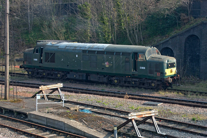 D6836, shunting, Leicester station 
 With its reproduction green paint scheme now looking somewhat faded D6836 makes a number of shunting moves in and out of UKRL's Leicester depot. Released into traffic in April 1963 this member of the class operated all over the country being based variously at York, Landore, Hull Dairycoates, Healey Mills and Tinsley. When numbered 37905 it also carried the name 'Vulcan Enterprise' for ten years from 1987 until 1997. It was withdrawn in 2005 being rescued from the breakers to enter preservation on the Battlefield Line finally being reinstated in 2011. 
 Keywords: D6836 shunting Leicester station