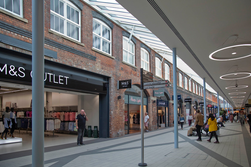 Interior, Swindon Outlet Village 
 This was once an exposed wall to one of the 'shops' of the GWR's Swindon Works. Now put to a new use to satisfy our insatiable appetite to spend money! 
 Keywords: Swindon Outlet Village