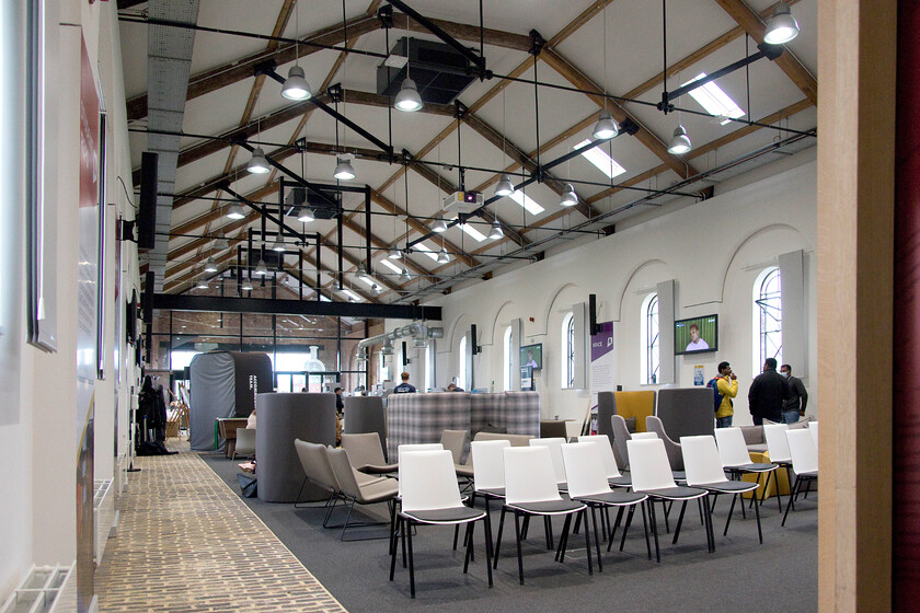 Interior of The Engine Shed, Students' Union building, UON Riverside campus 
 The restoration of the rebuilding of the Grade II listed Midland engine shed on the Riverside campus of the University of Northampton has been a triumph appearing to provide a perfect home for the Students' Union. The transformation was undertaken by the award-winning architectural and heritage consultancy practice Purcell. They document the work undertaken on their website, see..... https://www.purcelluk.com/projects/university-of-northampton-engine-shed 
 Keywords: Interior of The Engine Shed Students' Union building UON Riverside campus Univesity of Northampton