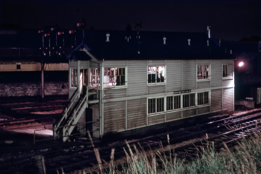 Newton Abbot West signal box (GW, 1925) 
 An alternative view of Newton Abbot West signal box taken at night. The box was constructed in 1925 by the Great Western when the station was extensively remodelled and expanded. The impressive down home gantry can be clearly seen behind the signal box. This scene is unrecognisable now with just three running lines remaining with everything in the foreground covered by a large car park. 
 Keywords: Newton Abbot West signal box Great Western