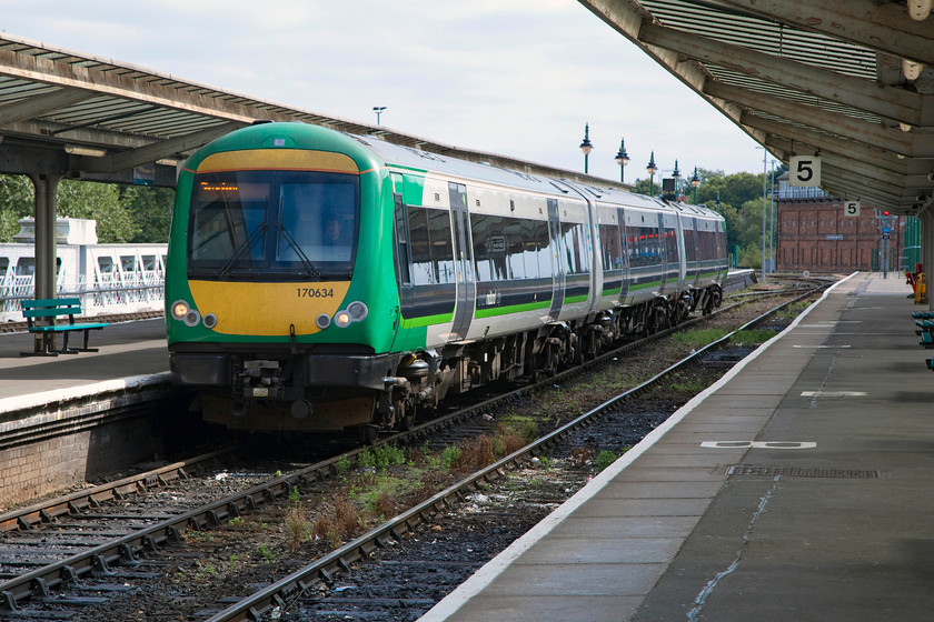 170634, LM 13.05 Birmingham New Street-Shrewsbury (1J16), Shrewsbury station 
 170634 arrives into Shrewsbury station with the terminating 1J16 13.05 from Birmingham New Street. Look at the weather, just as I return to the station to go home, the clouds start to clear and the sun comes out! 
 Keywords: 170634 13.05 Birmingham New Street-Shrewsbury 1J16 Shrewsbury station