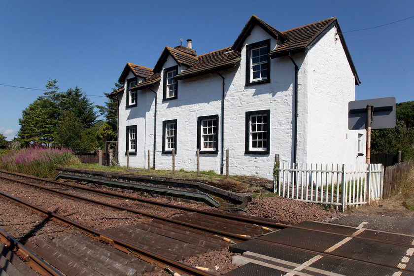 Former station & platform, Dunragit (Closed, 1965) 
 Dunragit station closed in 1965 along with a number of others on the route between Stranraer and Ayr and the complete closure of the Portpatrick and Wigtownshire Joint Railway from Challoch Junction to Dumfries, commonly referred to as The Port Road. The platform remains can be seen here with the old station building. 
 Keywords: station platform Dunragit