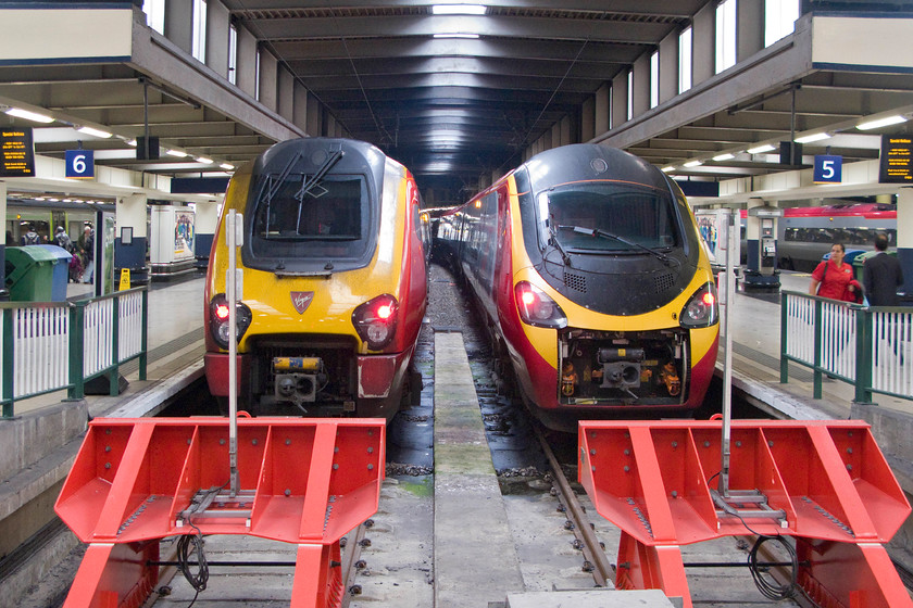 221103, VT 12.23 London Euston-Birmingham New Street (9G20) & 390129, VT 12.03 London Euston-Birmingham New Street (9G19), London Euston station 
 Two Virgin Trains that will work to Birmingham New Street within half an hour of each other wait at London Euston. To the right, the 9G19 will leave first with the 12.03 service worked by 390129 'City of Stoke-on-Trent'. To its left, 221103 will depart twenty minutes later from platform six with the 9G20 12.23 service. 
 Keywords: 221103 12.23 London Euston-Birmingham New Street 9G20 390129 12.03 London Euston-Birmingham New Street 9G19 London Euston station Virgin Train Pendolino City of Stoke-on-Trent