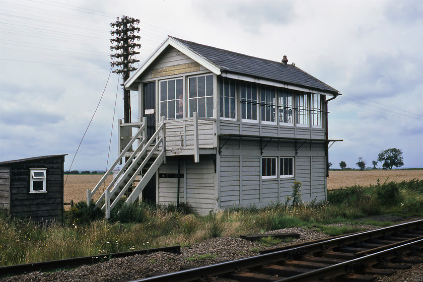 Donington Road signal box (GE, date not known) 
 I can find precious little out about Donington Road signal box located between Gosberton and Helpringham. It appeared to be switched out on the day of our visit and it looks a little run down with its nameboard missing. I suspect that the Great Eastern box will have dated from around the same time as the others along this stretch of line, c. 1880. 
 Keywords: Donington Road signal box Great Eastern Railway GER