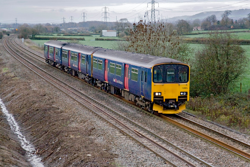 150926, GW 12.42 Gloucester-Frome (Warminster) (2C18), Berkley ST806498 
 On a drab December day the 12.42 Gloucester to Frome and thence return to Warminster, approaches Berkley worked by 150926. Notice the famous Westbury White Horse on the northern escarpment of Salisbury Plain, a feature that has appeared in many of my railway photographs over the years, see.... https://www.ontheupfast.com/p/21936chg/25426700804/x50020-07-50-london-paddington-paignton 
 Keywords: 150926 12.42 Gloucester-Frome Warminster 2C18 Berkley ST806498 First Great Western Great Western Railway