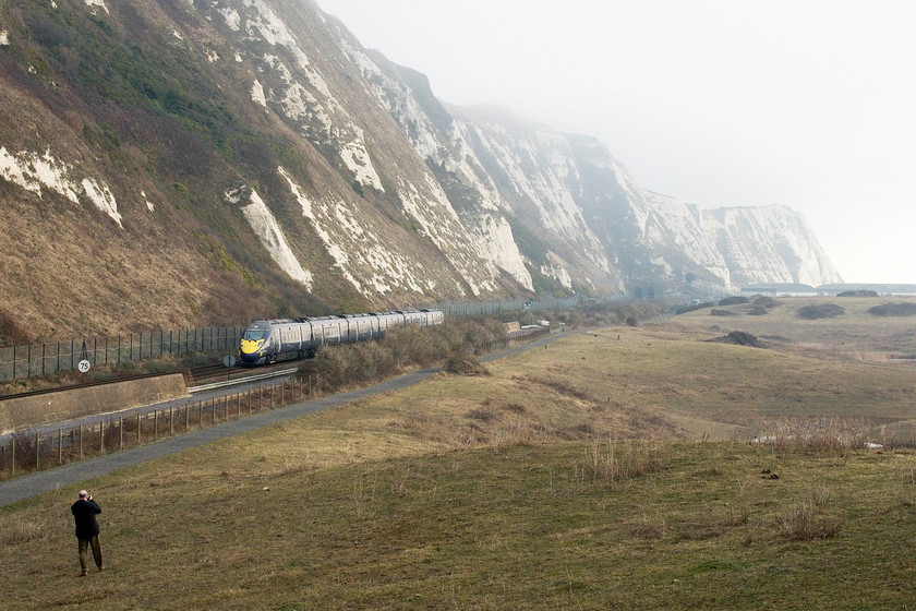 395011, SE 08.49 Dover-London St. Pancras International (1J19, RT), Samphire Hoe Country Park TR286388 
 Andy photographs 395011 'Katherine Grainger' working the 08.49 Dover to St. Pancras under the rather misty but fabled white cliffs. It is taken from the Samphire Hoe country park . This is a 30ha area of land was created from 4.9 million cubic metres of chalk marl that was excavated from under the channel during construction of the tunnel. 
 Keywords: 395011 08.49 Dover-London St. Pancras International 1J19 Samphire Hoe Country Park TR286388