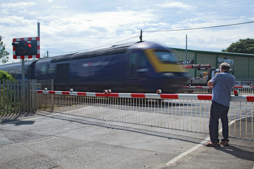 Andy, 43140, GW 10.06 London Paddington-Penzance, The-Cornish-Riviera , (1C077, 3L), Colthrop Crossing 
 Andy get his picture at Colthrop level crossing! He has captured 43140 'Landore Diesel Depot 1963 Celebrating 50 Years 2013 / Depo Diesel Gandwr 1963 Dathu 50 Mylnedd 2013' heading west with the down 1C99 'Cornish Riviera'. This along with a handful of others, is one of the best known and most fondly remembered titled trains of which a few still operate today but with little to differentiate them from others. 
 Keywords: Andy 43140 'The-Cornish-Riviera' 1C077 Colthrop Crossing