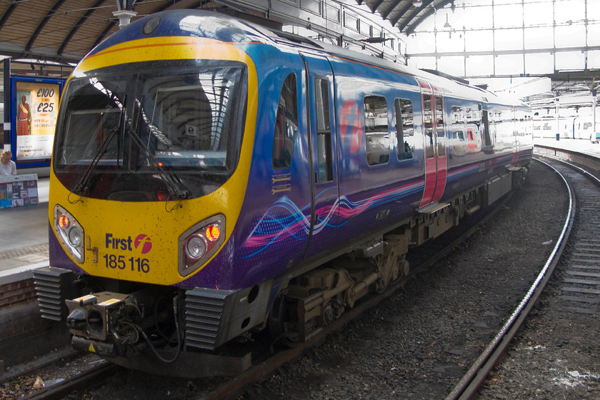 185116, TP 12.06 Newcastle-Liverpool Lime Street (1F68), Newcastle station 
 TransPennine Express' 185116 will soon leave Newcastle station with the 12.06 to Liverpool Lime Street. These fast and smart-looking units from the Desiro family are about ten years old now and are the backbone of services from east to west in the north of the country. In previous years, these services were worked by BR using a rake of Mk. I or Mk. II stock with a Peak class 45 at the front. 
 Keywords: 185116 12.06 Newcastle-Liverpool Lime Street 1F68 Newcastle station Trans Pennine Express