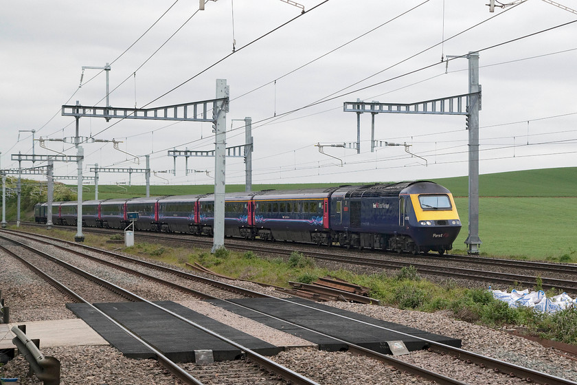 43179, GW 11.20 London Paddington-Great Malvern (1W23, 11L), Cholsey station 
 43179 'Pride of Laira' leads the 11.20 Paddington to Great Malvern through the electrification paraphernalia recently installed at the eastern end of Cholsey station. 43179 was built at Crewe and introduced to service in late 1981 as part of the upgrade to the NE/SW route. It was part of 253049 and named in 1991; the name it has carried ever since. 
 Keywords: 43179 1W23 Cholsey station