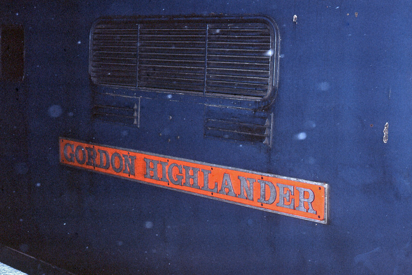 Nameplate, 55016, 22.30 London King's-Cross-Edinburgh (1S72), York station 
 The nameplate of 55016 'Gordon Highlander' is seen at York station. A photograph was taken in the middle of the night on a perishingly cold platform end as staff were attempting to replenish its steam heat boiler from pipes that were semi-frozen. This name had previously been carried by LMS 'Royal Scot' 46106 and LNER 'D20' (GNR class F) 62277 and was applied to 55016 28.08.64 at Aberdeen with a ceremony. 
 Keywords: Nameplate 55016, 22.30 London King's-Cross-Edinburgh 1S72 York station