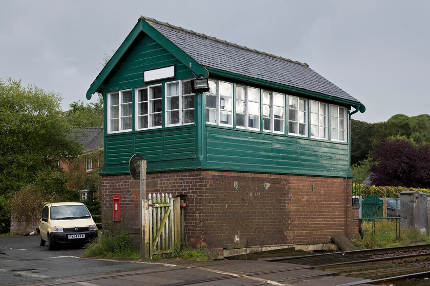 Corby Gates signal box (BR, 1955) 
 The impressively large Corby gates signal box is the first block box out of Carlisle on the route to Newcastle. Built by British Railways in 1955 it is a non-standard design replacing a previous structure across the River Eden to the west in Wetherall. The box has been extended witnessed by the different shades of bricks in the base. As well as controlling the semaphores it also operates the level crossing that is unusual in that it has no audible or visual warnings relying solely on the observation of the signalman. Notice the historical George V postbox incorporated into the base. 
 Keywords: Corby Gates signal box