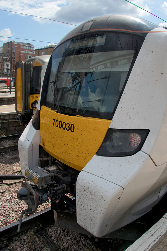 700030, GN 12.51 London King`s Cross-Cambridge North (2C26, 6L) & 387128, GN 10.44 King`s Lyn-London King`s Cross (1T25, 4L), London King`s Cross station 
 My train north to Potters Bar waits at King's Cross station formed of 700030. This service was the 12.51 to Cambridge North, the relatively new station opened during May 2017. With a very different front end profile, Electrostar 387128 has just arrived into London with the 10.44 from King's Lyn. 
 Keywords: 700030 12.51 London King`s Cross-Cambridge North 2C26 387128 10.44 King`s Lyn-London King`s Cross 1T25 London King`s Cross station