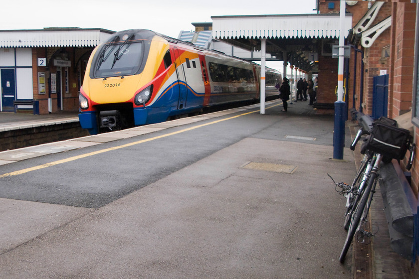 222016, EM 11.01 London St. Pancras-Corby (1M26), Wellingborough station 
 My train arrives at Wellingborough station. I took 222016 working 11.01 St. Pancras to Corby the short distance to Kettering, a journey time of about eight minutes. Notice my classic Raleigh Royal bike leaning against the wall soon to be loaded on to the train. As the journey was just one stop and very short, I kept it in the vestibule with me rather than bothering the guard to stow it in the tiny bike stowage area. 
 Keywords: 222016 11.01 London St. Pancras-Corby 1M26 Wellingborough station