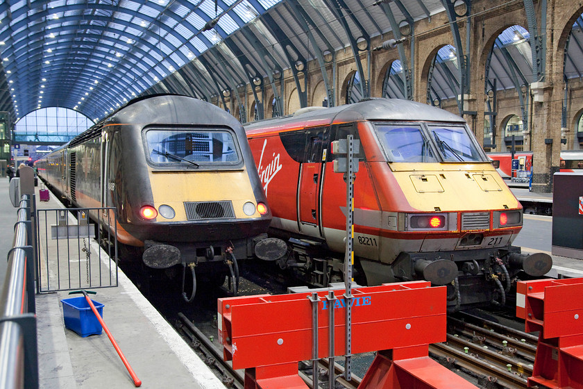 43468, GC 08.11 London King`s Cross-Sunderland (1N90) & 82211, GR 08.00 London King`s Cross-Edinburgh (1S07), London-King`s Cross station 
 Grand Central's 43468 waits at King's Cross to work the 08.11 to Sunderland. Next to it, 82211 will be at the rear of the 1S07 to Edinburgh. 43468 was originally numbered 43068, an Eastern Region power car that was part of set 254007. Along with a small number of other power cars It was fitted with buffer beams as an interim measure in the late 1980s when the plan was to use them as DVTs prior to the late delivery of the class 91s and class 82 DVTs as per its neighbour in this picture! 
 Keywords: 43468 08.11 London King`s Cross-Sunderland 1N90 82211, GR 08.00 London King`s Cross-Edinburgh 1S07 London-King`s Cross station