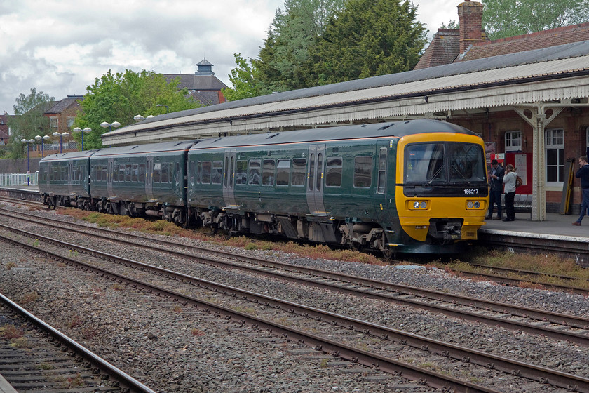 166217, GW 12.38 Bedwyn-London Paddington (1K61), Newbury station 
 One of Great Western's Turbos painted into their new 'classic' green livery pauses at Newbury station with the 12.38 Bedwyn to Paddington working. I took this train as far as Reading. 
 Keywords: 166217 12.38 Bedwyn-London Paddington 1K61 Newbury station