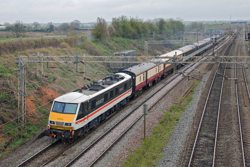 90001, 07.10 Crewe HS-London King's Cross (5Z54, 10E), Victoria bridge 
 Bringing up the rear of the 5Z54 07.10 Crewe HS to Kings Cross ECS 90001 Royal Scot is not under power allowing Deltic D9000 Royal Scots Grey to do all the work at the front. The stock was heading to Kings Cross via the North London line and a reversal at Hornsey in order to work a one-way private charter operated by LSL to Edinburgh via the ECML later in the day. Unfortunately, the Deltic gave trouble on the later run between Grantham and Newark with the electric having to give some assistance with the train arriving over an hour late into Waverley. 
 Keywords: 90001 07.10 Crewe HS-London King's Cross 5Z54 Victoria bridge Royal Scot