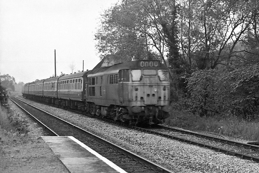 31293, unidentified Portsmouth Harbour-Bristol TM working, Avoncliff Station 
 31293 was a regular performer on this line. It's seen here passing the tiny halt of Avoncliff in the Avon Valley between Bradford-on-Avon and Bath. This was typical formation for this working as was the 0000 headcode display prior to the panels being plated over and marker lights installed.