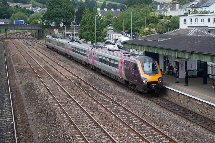 220031, XC 11.25 Plymouth-Dundee (1S49, 1E), Totnes station 
 Totnes station in Devon still retains it two through lines that is not a particularly common feature of many stations today. Cross Country 220031 slows for its stop at the station working the 11.25 Plymouth to Dundee 1S49 working. This is not a journey that I would relish on a Voyager that, at the end of the day, is nothing more than a glorified DMU ! 
 Keywords: 220031 1S49 Totnes station