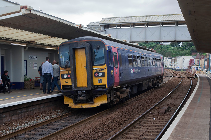 153369, GW 15.50 Exeter St. Davids-Plymouth (2P93, RT), Dawlish station 
 153369 stands at Dawlish station whilst working the 15.50 Exeter St. David's to Plymouth working. When I last visited Dawlish station in 2006 it still had its historic vaulted signal box in-place on the up platform. Despite many rescue attempts, this was finally demolished during July 2013. 
 Keywords: 153369 2P93 Dawlish station