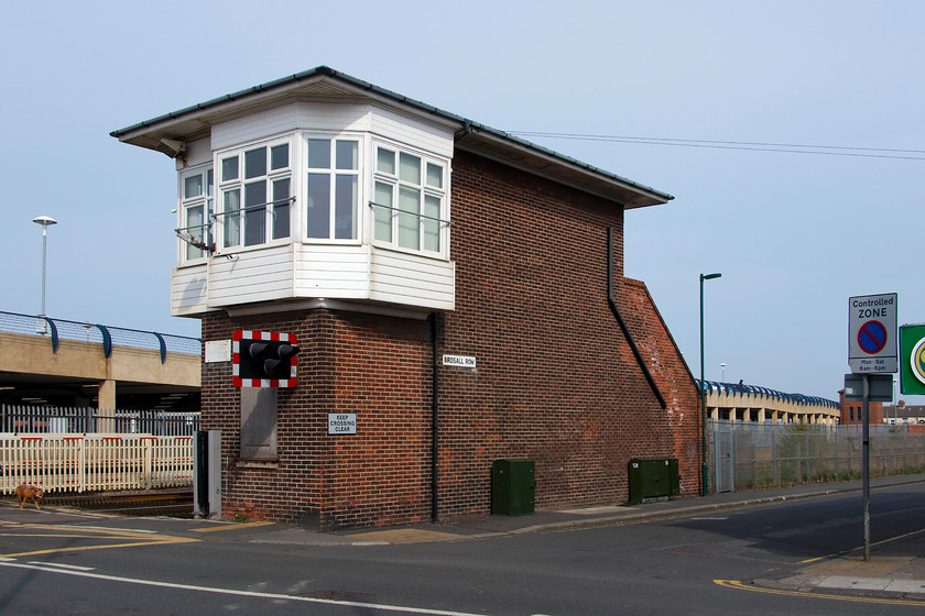 Redcar signal box (LNER, 1937) 
 The unusually designed Redcar signal box sits at a level crossing where West Dyke Road crosses the line. The box is an unusual design being constructed by the LNER in 1937. The box contains no frame with the semaphores having been abolished some years ago. However, it does have two interesting features. Firstly, last year Network Rail installed a, so far, unique pair of sliding barriers that cross the road from left to right locking into the vertical grey box on the end wall of the box. These replace the wheeled gates that had become notoriously unreliable, particularly in windy conditions. A video of these gates in operation can be found at.... https://www.networkrailmediacentre.co.uk/resources/the-sliding-gate-barriers-in-action-at-west-dyke-road-redcar . The other feature is the glass floor panel to enable the signalmen to observe the action of the gates below the box. The panel is installed in the overhanging section of the floor directly above where the warning lights are installed. 
 Keywords: Redcar signal box