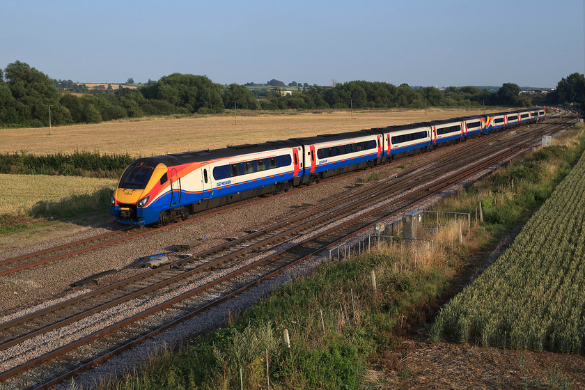 222016 & 222021, EM 18.00 London St. Pancras-Melton Mowbray (1M61, RT), Harrowden Junction 
 222016 and 222021 take the down relief line at Harrowden junction in preparation for their next stop at kettering. From there, the 18.00 St. Pancras to Melton Mowbray will take the Corby line to Manton Junction. After termination at Melton Mowbray, it works as ECS to Nottingham via Syston North Junction ready to work another up service to St. Pancras again. 
 Keywords: 222016 222021 1M6 Harrowden Junction