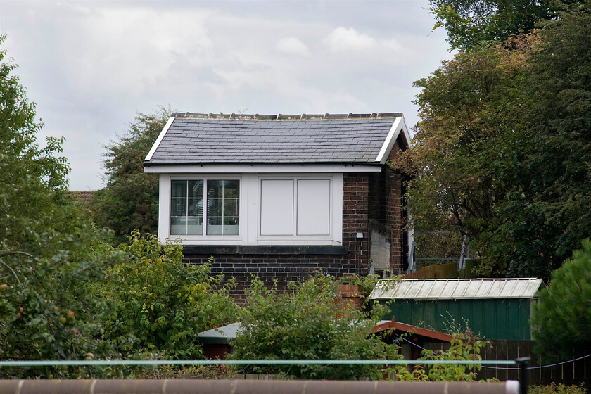 Norton South signal box (NE, 1870) 
 A very tricky signal box to get to is Norton South Junction that is located in the middle of a housing estate with no trackside access. Consequently, I have had to make do with this rather poor image taken standing on a wall looking across gardens using my zoom lens on full! However, it was important to secure a photograph as at this time it was the oldest operational signal box on the network dating from 1870. However, the historical significance of this will not save the signal box as it is due to be replaced as the whole Durham Coast route is due to be modernised with control moving to the York Signalling Centre. Thus, the curtain will come down on nearly one hundred and fifty years of consistent operation; its an interesting thought that there are few things done the same today as they were back in Victorian times. 
 Keywords: Norton South signal box North Eastern Railway