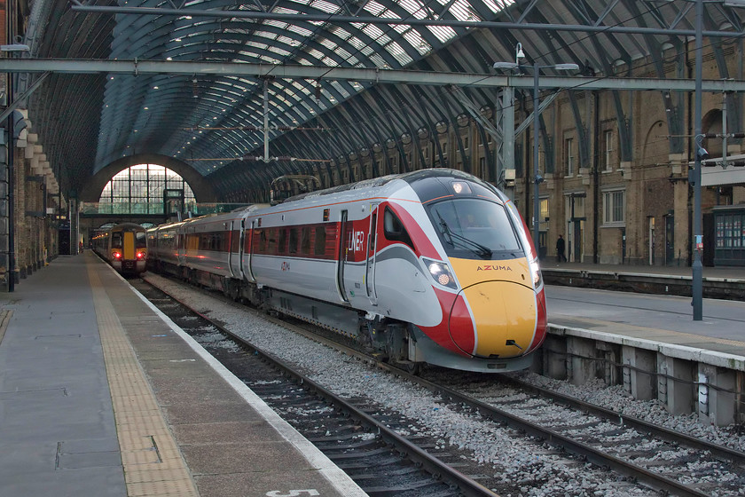 800210, GR 15.33 London King`s Cross-Lincoln Central (1B88, 5L), London King`s Cross station 
 Having gone over to Azuma operation last month, the 15.33 King's Cross to Lincoln (I refuse to refer to it as Central) service leaves King's Cross formed by 800210. This Azuma is one of the five-car sets that is replacing a nine-car HST, even with its slightly greater seating capacity, the HST will trump it when it comes to space and comfort....progress? 
 Keywords: 800210 15.33 London King`s Cross-Lincoln Central 1B88 London King`s Cross station LNER Azuma