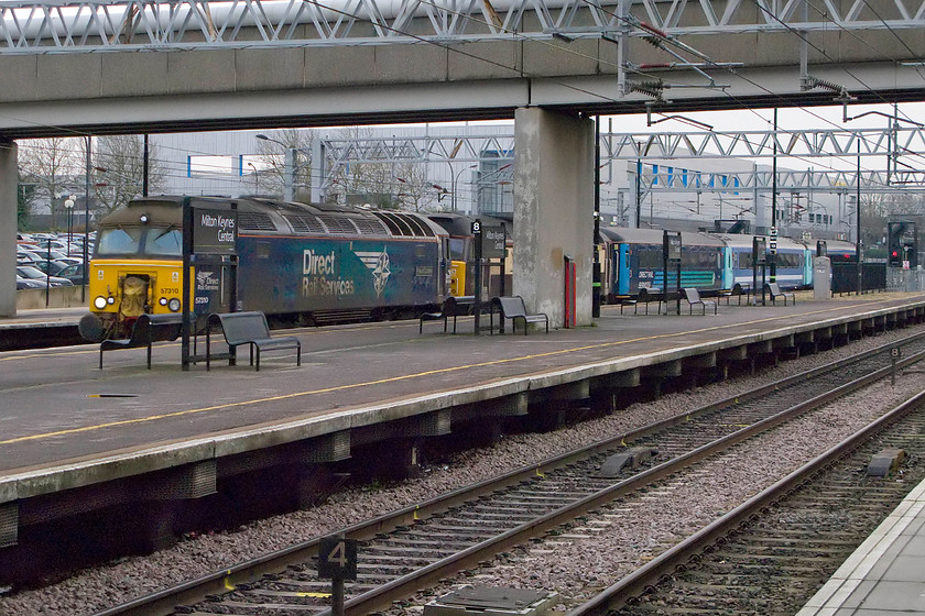 57310 & 47790, 08.59 Norwich Crown Point-Wolverton Centre Sidings (5Z55), Milton Keynes station 
 Superpower for three Mk. III coaches! 57310 'Pride of Cumbria' and 47790 'Galway Princess' haul three coaches as the 08.59 Norwich Crown Point to Wolverton centre sidings through Milton Keynes. Despite that the train only has about two miles to the end of its journey it was still going at a fair pace not enabling me to get to a better vantage point for a photograph! 
 Keywords: 57310 47790 08.59 Norwich Crown Point-Wolverton Centre Sidings 5Z55 Milton Keynes station DRS Direct Rail Services Pride of Cumbria Northern Belle Galway Princess