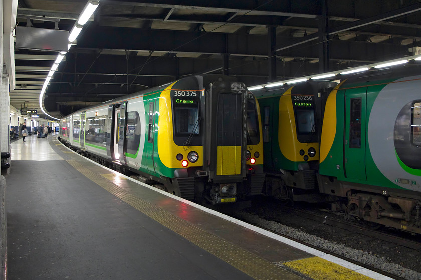 350375, LM 19.46 London Euston-Crewe (1U49, RT) & 350236, ECS, London Euston station 
 In the dark at Euston station 350375 waits with the 19.46 to Crewe. Next to it is 350236 attached to another unit that left shortly afterwards as an ECS move. 
 Keywords: 350375 19.46 London Euston-Crewe 1U49 350236 ECS, London Euston station