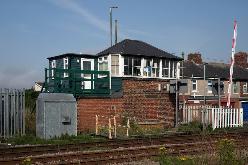 Newsham signal box (NE, date not known) 
 Newsham signal box is seen in the early morning sunshine located at a level crossing on South Newsham Road. If you were to remove the hideous extension with the beach house-like structure on the top the hip-roofed North Eastern Railway structure is remarkably un-molested with its original wooden window frames. The date of construction is not known but I suspect that it will be somewhere around 1880. 
 Keywords: Newsham signal box