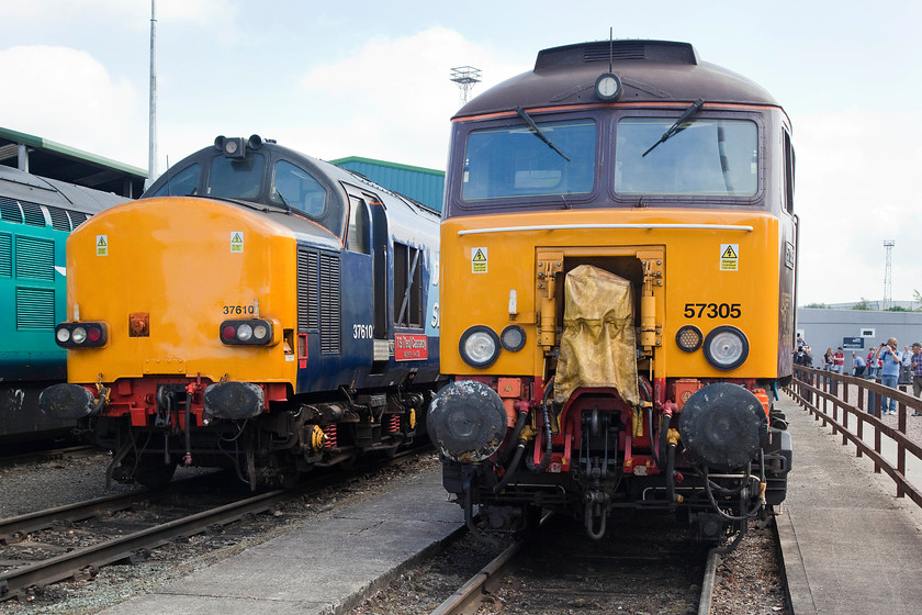 37610 & 57305, on-display, DRS Gresty Bridge 
 37610 'T.S. (Ted) Cassady 14.5.61-6.4.08' is on-dispaly at Crewe Gresty Bridge with 57305 'Northern Princess' next to it. The class 57 is painted in Northern Belle's attractive Crimson Lake and Cream livery. It is operated by DRS on behalf of Northern belle and can be seen all over the country undertaking these duties. 
 Keywords: 37610 57305 DRS Gresty Bridge