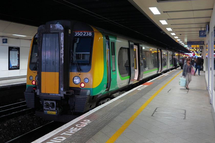 350238, LM 12.54 Birmingham New Street-London Euston (2Y10, 6L), Birmingham New Street station 
 Our train back home to Northampton is formed of 350238. It is preparing to leave working the 12.54 2Y10 stopper to London Euston. I appreciate the work completed at New Street to improve it but the results down on the platforms are somewhat more limited than up above in the ticket hall and the shopping centre. 
 Keywords: 350238 12.54 Birmingham New Street-London Euston 2Y10 Birmingham New Street station