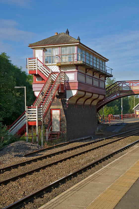 Haltwhistle signal box (Restored) (NE, not known) 
 Haltwhistle signal box must rank almost one of the most impressive on the railway network even if it has been out of use since 1993! The North Eastern Railway opened the box in 1901 with it being constructed on a narrow brick base with the timber top cantilevered out over the track in an effort to save space. To the rear of the box was access to the bay platform for the former Alton branch that was shut by BR in May 1976. Today the box is Grade II listed and in use as an office, see. https://historicengland.org.uk/listing/the-list/list-entry/1156313 
 Keywords: Haltwhistle signal box