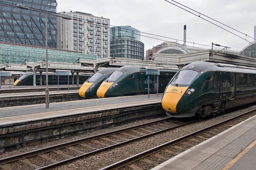 800320, GW 10.04 Paddington-Penance (1C76, 1L), 800312, GW 10.02 Paddington-Bath (1C09, 6L), 800309, GW 09.50 Paddington-Hereford (1W01, 5L) & 800307, GW 09.48 Paddington-Swansea (1C09, 6L), London Paddington station 
 I took a long walk along the length of Paddington's platform one, that is without the inconvenience of a gate line barrier, to find a uniform lineup of four GWR IETs. From left to right they are.....

800320, 10.04 Paddington-Penance (1C76, 1L)
800312, 10.02 Paddington-Bath (1C09, 6L)
800309, 09.50 Paddington-Hereford (1W01, 5L)
800307, 09.48 Paddington-Swansea (1C09, 6L) 
 Keywords: 800320 10.04 Paddington-Penance 1C76 800312 10.02 Paddington-Bath 1C09 800309 09.50 Paddington-Hereford 1W01 800307 09.48 Paddington-Swansea 1C09 London Paddington station GWR Great Western Railway