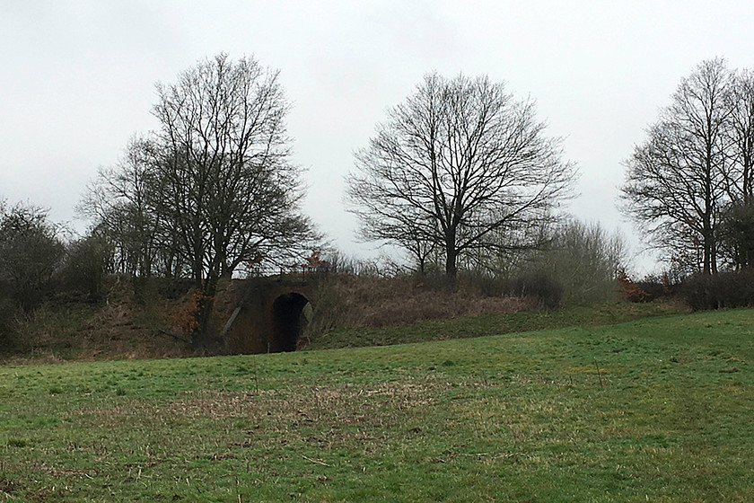 Former SMJR embankment & bridge, Easton Neston SP715501 
 In this remote spot on the land managed by Easton Neston Park near to Towcester are two grand and very smart bridges carrying the trackbed of the former SMJ Railway within a hundred metres or so of each other. Both cross farm tracks so I suspect that when the line was being planned the then Lord Hesketh demanded these high-quality structures as a condition of its construction across his land in the 1880s. 
 Keywords: Former SMJR embankment & bridge, Easton Neston SP715501 Stratford-upon-Avon and Midland Junction Railway