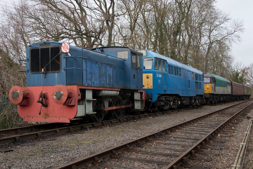 764, 31289 & 47205, stabled, Pitsford sidings 
 A fine lineup stabled on the Northampton and Lamport Railway's Pitsford sidings is led by industrial Ruston & Hornsby 0-4-0 shunter 'Sir Gyles Isham'. This has been a long-term resident on the NLR along with Type 2 A-1-A Class 31 number 31289 (D5821) 'Phoenix' which is second in line. Bringing up the rear is Brush Type 4 47205 (formally D1855) which has also been a regular performer on the line for a number of years but not for as long as the other two locomotives are seen here. 
 Keywords: 764 31289 47205 stabled Pitsford sidings D5821 Phoenix 0-4-0 Sir Gyles Isham