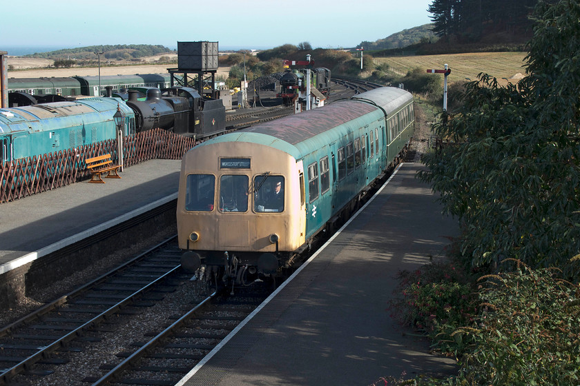 M51188 & M56352, 11.20 Sheringham-Holt, Weybourne station 
 The class 101 DMU leading, M51188, is on-loan to the NNR but could do with some attention to its paintwork. On the rear of this combo, M56352 in British Railways green is in better condition. This 101 DMU carriage is on long term loan from the National Railway Museum and sees a lot of use. The reason for the leading loan car being used is that the other green car, M51192, is undergoing repair after a catastrophic engine failure. 
 Keywords: M51188 M56352 11.20 Sheringham-Holt Weybourne station