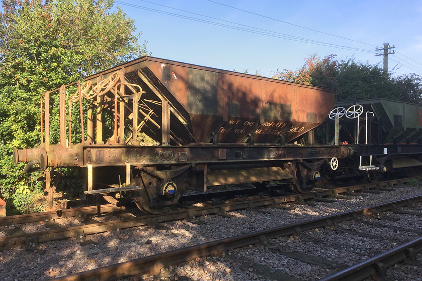 DB993270, stored, Pitsford sidings 
 Stored in Lamport sidings at the NLR are two Dogfish 24 ton Ballast Hoppers. In the foreground is DB993270 that was built in 1959 by Charles Roberts & Co. of Horbury Junction, Wakefield (also known as Chas Roberts & Co.) Next to it is another Dogfish 24 ton Ballast Hopper Wagon DB993399, built in 1959 by Metro-Cammell, Saltley, near Birmingham. The latter has been restored and is operational on the line seeing use when PW department ballast the track and has seen recent work on the NLR's extension south to Boughton crossing. 
 Keywords: DB993270 Pitsford sidings