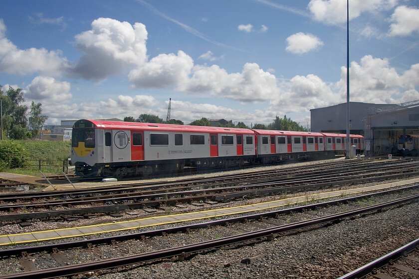 230008, stabled, Birkenhead North TMD 
 On passing Birkenhead North Merseyrail depot I was surprised to see one of Transport for Wales' Vivarail hybrid units stabled in full view. These units have been undergoing testing and training on the borders line towards Wrexham for some time now. 230008 is seen awaiting its next test run and hopefully, it will be entering service with TfW soon. 
 Keywords: 230008 Birkenhead North TMD