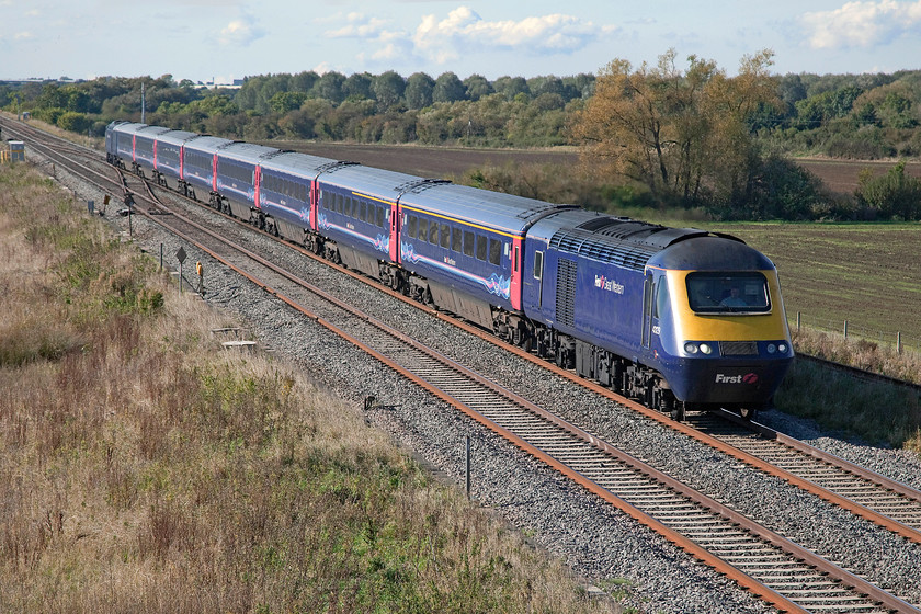 43129 & 43010, GW 13.00 Bristol Temple Meads-London Paddington (1A18), Bourton SU228874 
 43129 leads 43010 working the 13.00 Bristol Parkway to Paddington. The train is getting into its stride after its Swindon stop some few miles back as it approaches Bourton and Shrivenham. This long and elevated section of line has been a favourite spot with photographers for many years but this will change soon with the arrival of the electrification paraphernalia. 
 Keywords: 43129 43010 13.00 Bristol Temple Meads-London Paddington 1A18 Bourton SU228874