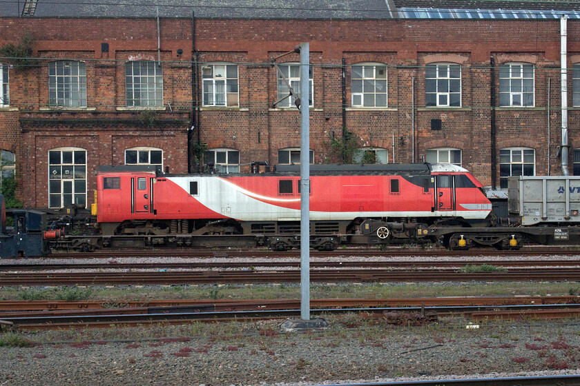 91108, being stripped, Doncatser Works 
 Despite not operating a service since it worked the 16.30 Edinburgh Waverley to King's Cross on 22.07.19 91108 was not officially withdrawn until 17.08.19 being the first member of the class to be condemned running under its own power to Doncaster for component recovery and cutting. The first stage of its disposal appears to be the removal of the nose, like 91103 dumped close by. My last picture of this 1988 built IC225 locomotive was at Potters Bar just ten days before its withdrawal, see.....https://www.ontheupfast.com/p/21936chg/27085857404/x91108-13-03-london-king-s-cross 
 Keywords: 91108 being stripped Doncatser Works LNER IC225