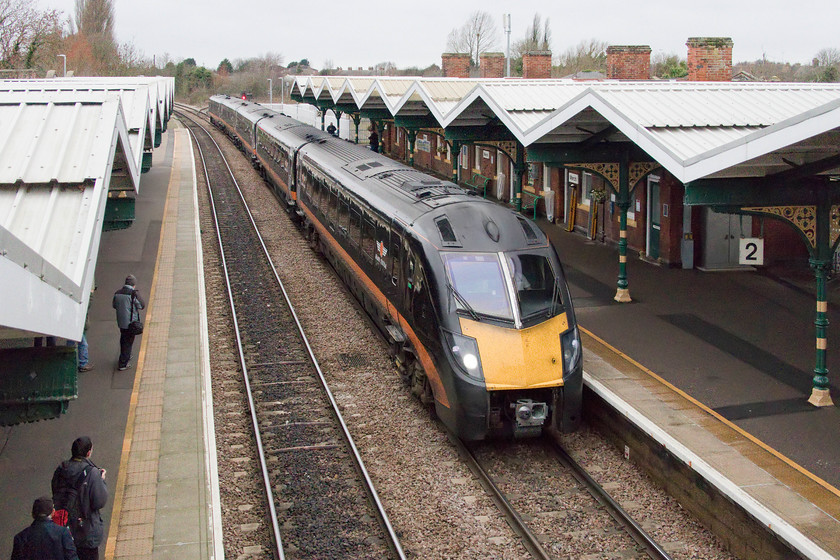 180101, GC 09.23 Sunderland-London Kings Cross (1A60, RT), March station 
 Just some of the many photographers who had gathered on March station are in view here as Grand Central's 180101 passes through the station with the 09.23 Sunderland to King's Cross. I like March station but it's somewhat of a shadow of its former self having only two of its former four platforms in use. However, with continued talk of the reopening of the Wisbech branch in some form or another could they brought back into use again? 
 Keywords: 180101 09.23 Sunderland-London Kings Cross 1A60 March station