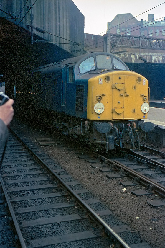 40113, outward leg of The Scanner Express, Axminster-York, Birmingham New Street station 
 This is a picture that I do not quite understand? It shows 40113 at the head of The Scanner Express railtour that started out at Axminster and went to York. According to Six Bells Junction, the 40 took over from 47122 here at New Street. However, this image appears to show the 40 arriving into the station from the western end that is odd? That is unless it was performing a shunting move reversing out of the station for some reason or another.....help anybody? 
 Keywords: 40024 Scanner Express Axminster-York Birmingham New Street station